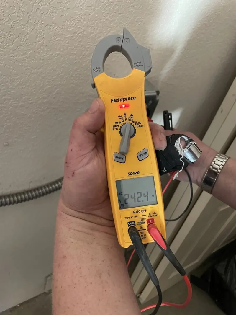 Voltage testing with clamp meter during Generator Installation in Ozark